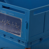 ماشین بازی وانت پلاستیکی طرح نیسان جونیور با طراحی دقیق، حرکت به جلو و عقب، چهار چرخ، ابعاد 280x100x100 میلیمتر و وزن 600 گرم